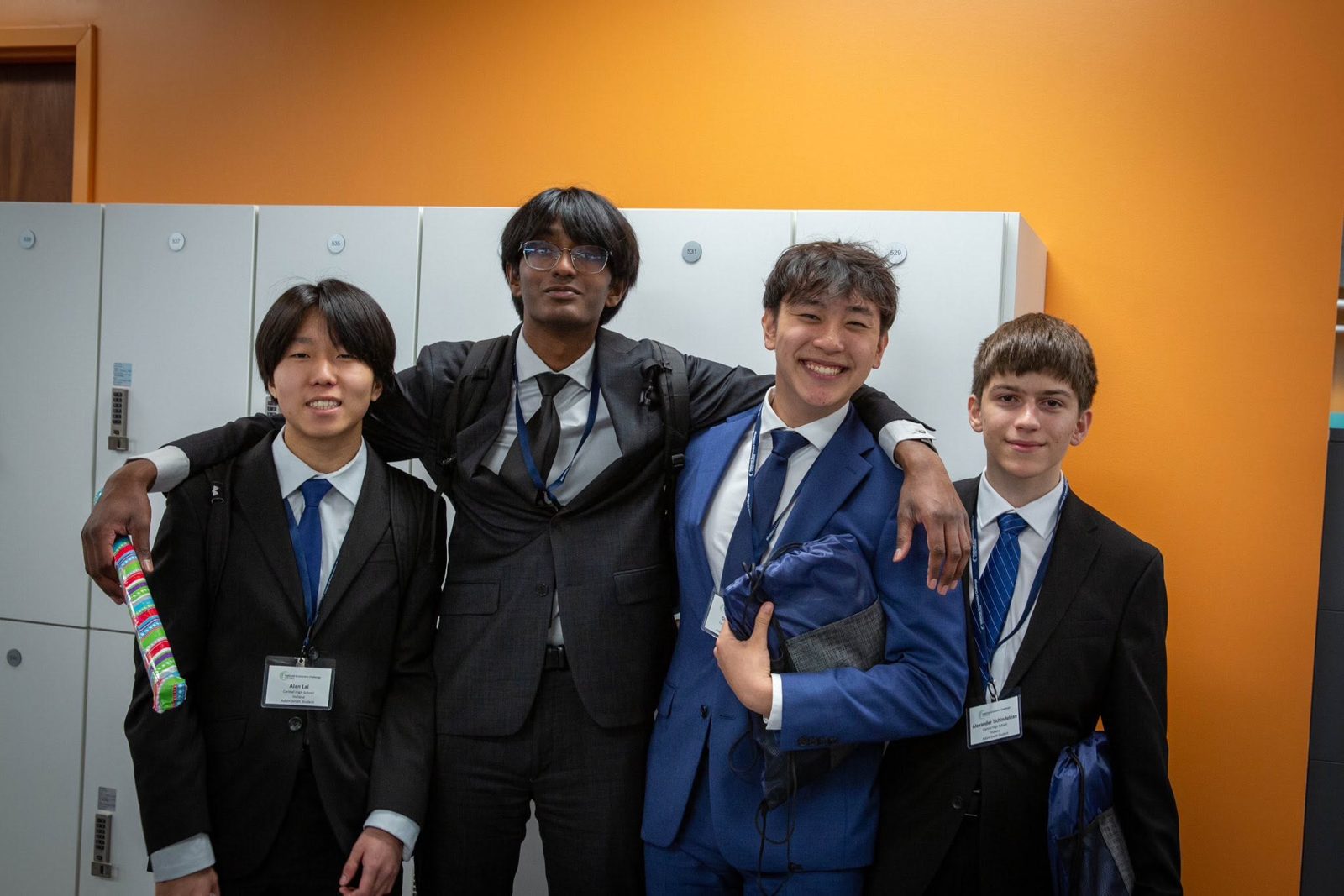 A team of four high school students at a CEE competition