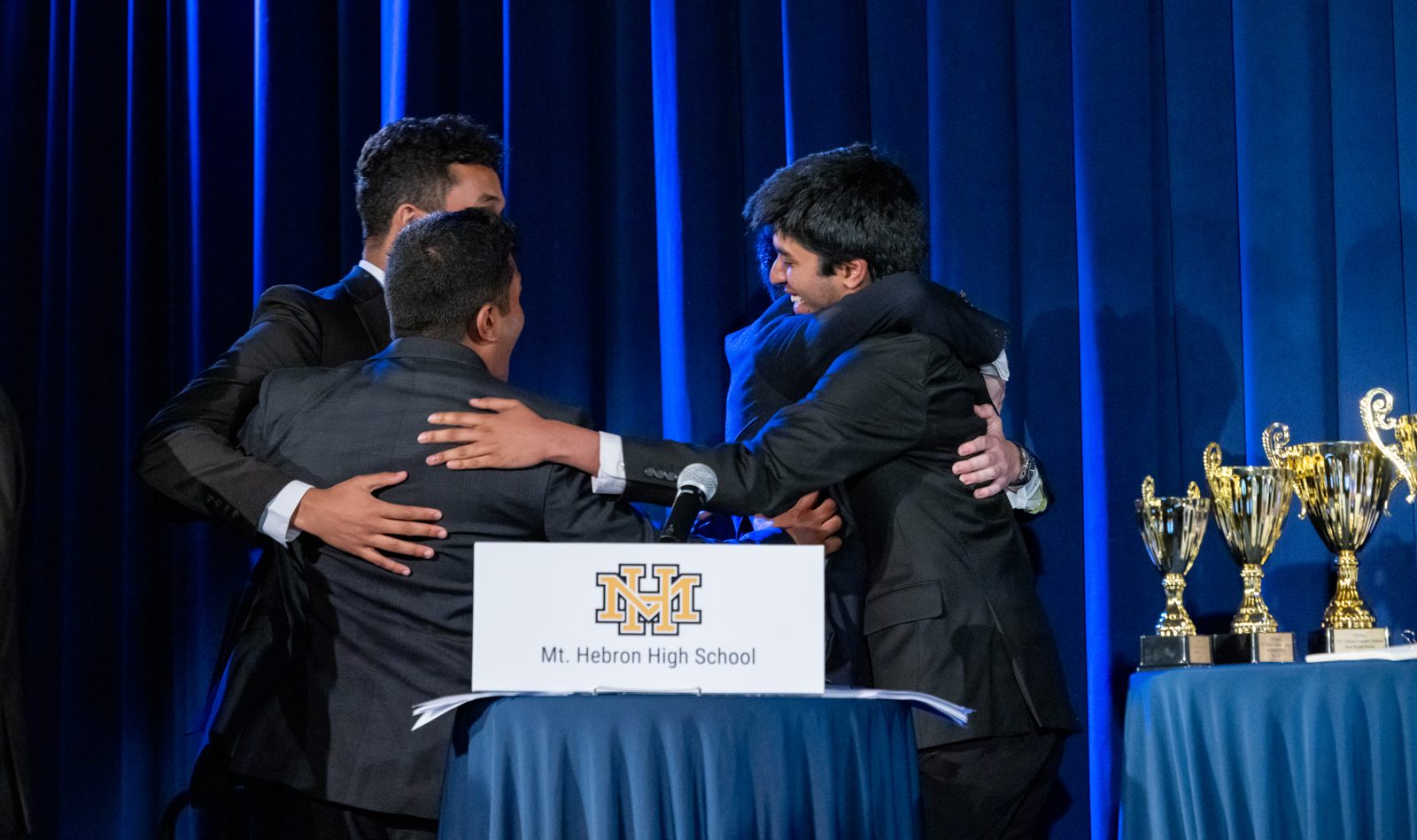 National Economics Challenge finalists celebrate on stage